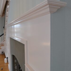 Refinished mantle painted in smooth white finish.